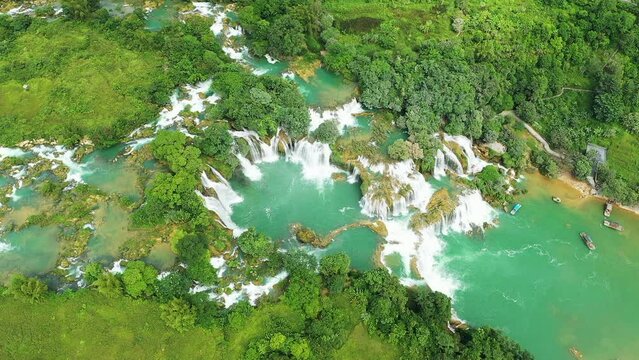 The beautiful Ban Gioc waterfalls on the border with China, Asia, northern Vietnam, in Cao Bang, towards Lang Son, in summer, on a sunny day.
