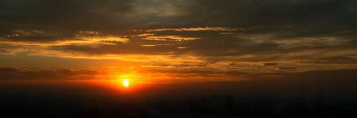 Bright orange sunset. clouds