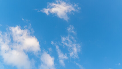 Beautiful blue sky background, white clouds.