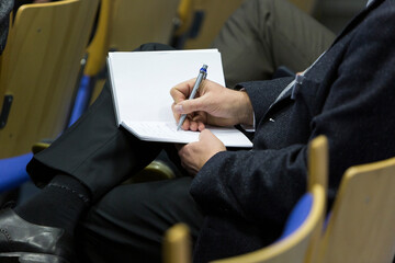 Notizen machen während der Tagung