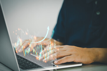 Man hands using computers to analyze data and investment charts. Financial trading plans and digital banking technology marketing.