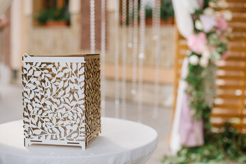 Stylish large arch for a wedding ceremony on the outdoors on a sunny day