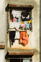 Apartment building in India with laundy in the window
