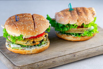 veggie burger on a wooden board