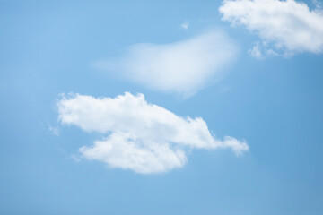 The sky on a fine day. puffy clouds in the blue sky