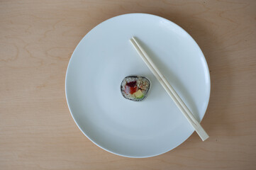 sushi roll on a plate