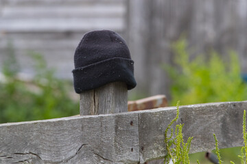 Lost Hat on a Post
