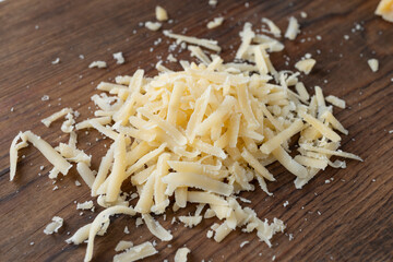 Heap of grated parmesan, healthy food, dairy product