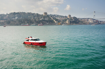 Obraz premium Red boat tour in Bosphorus