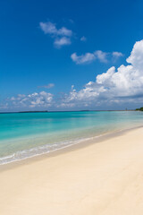 Beautiful background image of tropical beach, Blue sky with awesome clouds, turquoise ocean with clear sand, photo taken from Maldives beach