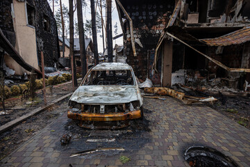 Irpin, Kyev region Ukraine - 09.04.2022: Cities of Ukraine after the Russian occupation. Cars...