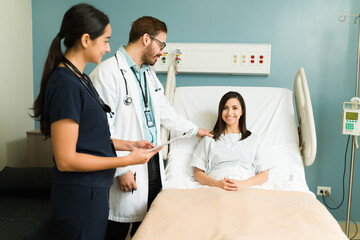 Smiling young woman hospitalized