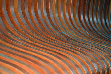 Texture of curved lacquered wooden planks. Abstract background.