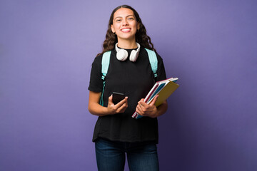 Attractive woman texting at university