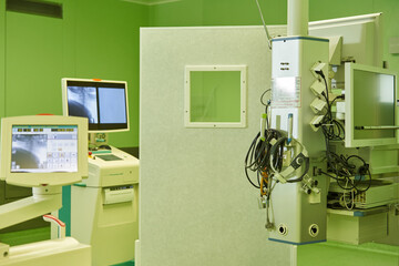 medical device in the operating room with two monitors showing the progress of the operation