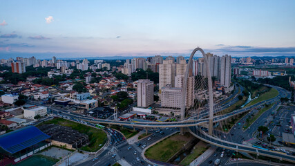 Fototapeta na wymiar Sao Jose dos Campos, Sao Paulo, Brazil - 04, 2022:.Aerial view of the cable-stayed bridge in São José dos Campos known as the innovation arch.
