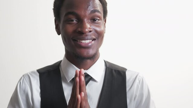 Business man prayer. Begging please. Success opportunity. Hopeful gentleman asking for favor with folded hands isolated on white empty space background.