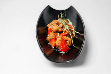 Teriyaki, asian food, Chinese dishes, teriyaki on black plate, microgreen