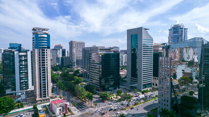 Aerial view of Avenida Brigadeiro Faria Lima, Itaim Bibi. Iconic commercial buildings in the background. With mirrored glass