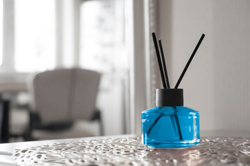 Perfume for home in a glass bottle
