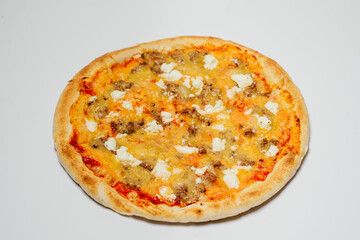 delicious hot pizza with chicken, mozzarella and tomatoes on a white background top view