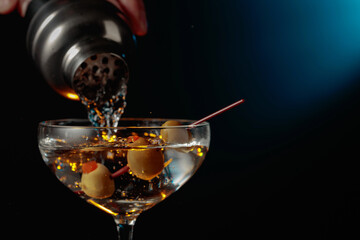Martini with green olives.