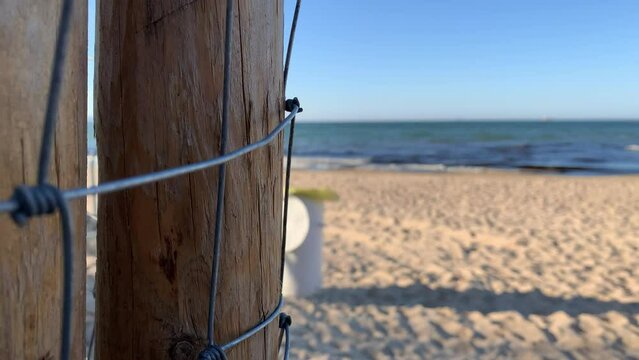 wooden fence on the beach