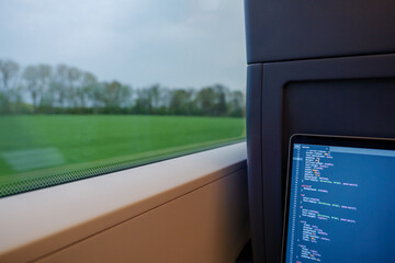 Selective focus, open laptop or notebook, working as programmer and do some coding on the train...