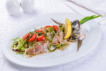 ceviche from dorado on a white plate