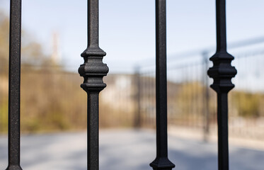 Close up metal railings and handrails in the loft style. The metal is treated with a primer and anti-corrosion paint. Interior design in industrial style.