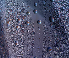 Close-up view of water drops on glass