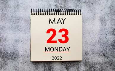 Save the Date written on a calendar - May 23