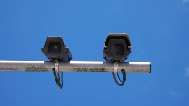 Two security CCTV camera or surveillance system in office building..