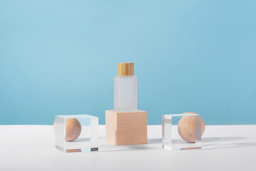 Medical skincare and cosmetic cream mockup on wooden block pedestal podium with stylish props,...