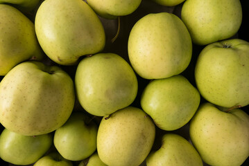 golden delicious apples at a farmers market