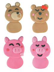 Set of Kissing bear and pig made from plasticine on white background