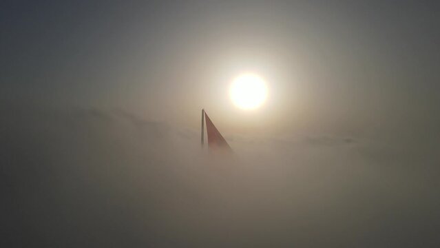 Turkish Flag and Fatih Sultan Mehmet Bridge in the Foggy Morning, Drone Video Uskudar, Istanbul Turkey