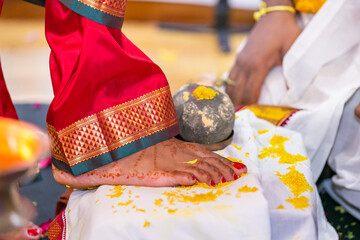 Tamil Hindu wedding ceremony rituals, bride's feet and rings close up