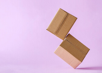 Cardboard boxes in levitation mail delivery and logistics concept.
