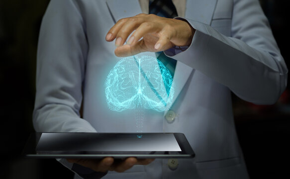 woman doctor holding smart device with futuristic hologram, futuristic brain model and modern medical concept