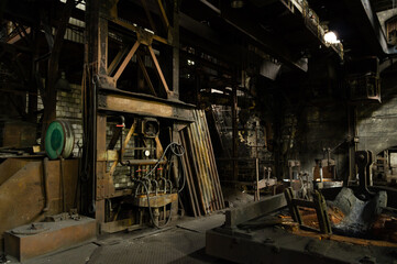 Fototapeta na wymiar Cold furnace of abandoned industrial foundry