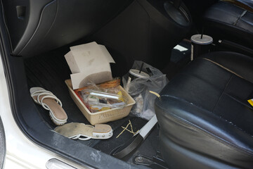 dirty car interior , carpet on the footwell has trash,food waste, dirt spilled across it. Needs to...