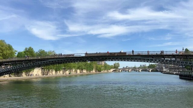 View of Paris from the ship from the River Seine to the numerous bridges of Paris. High quality 4k footage