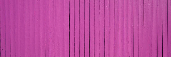 Background pink wooden fence planks texture in wood wallpaper in panoramic web format and header