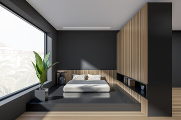 Wooden bedroom interior with bed on podium, window on countryside