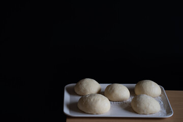 Round bread before baking