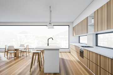 Side view on bright kitchen room interior with panoramic window