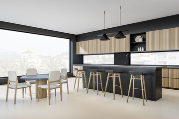 Corner view on dark kitchen room interior with dining table