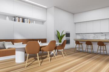 Stylish kitchen interior with seats, eating table and countertop, kitchenware