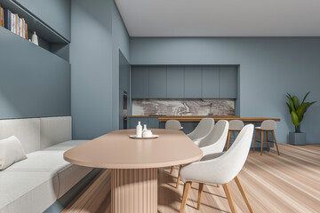 Stylish kitchen interior with eating table and chairs, countertop and shelf